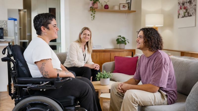 Two potential SIL housemates meeting in a shared living room