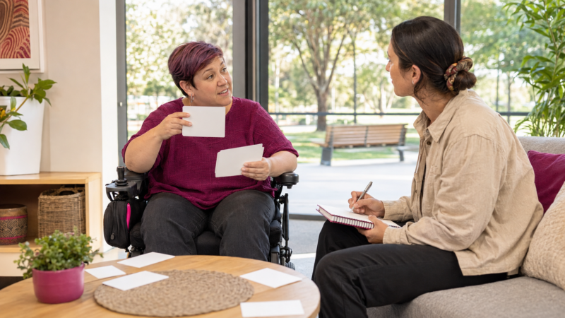 Wheelchair user leading a community participation goal-planning conversation