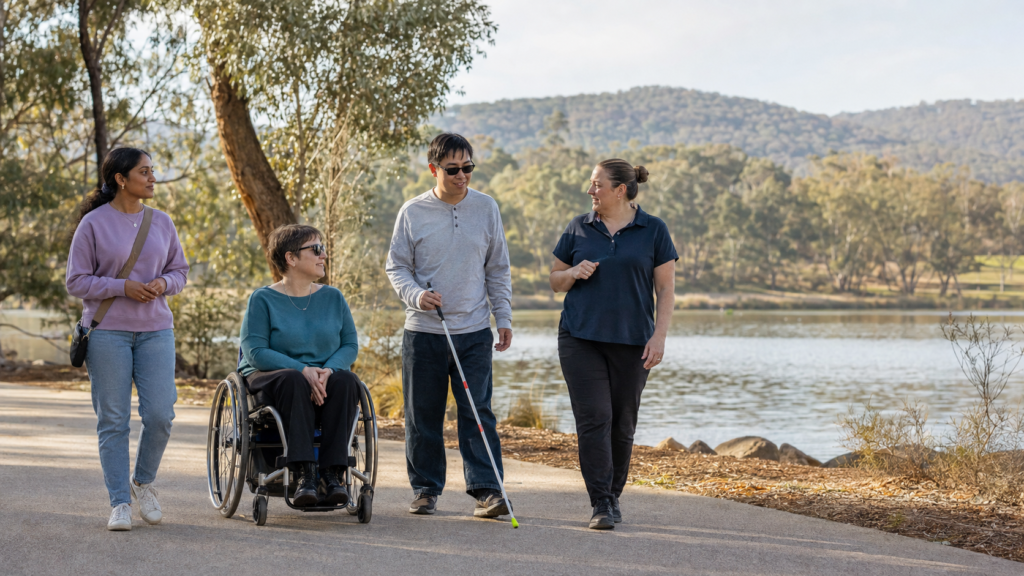 Inclusive group enjoying an accessible lakeside activity in Canberra
