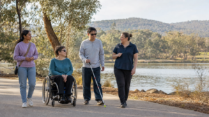 Inclusive group enjoying an accessible lakeside activity in Canberra